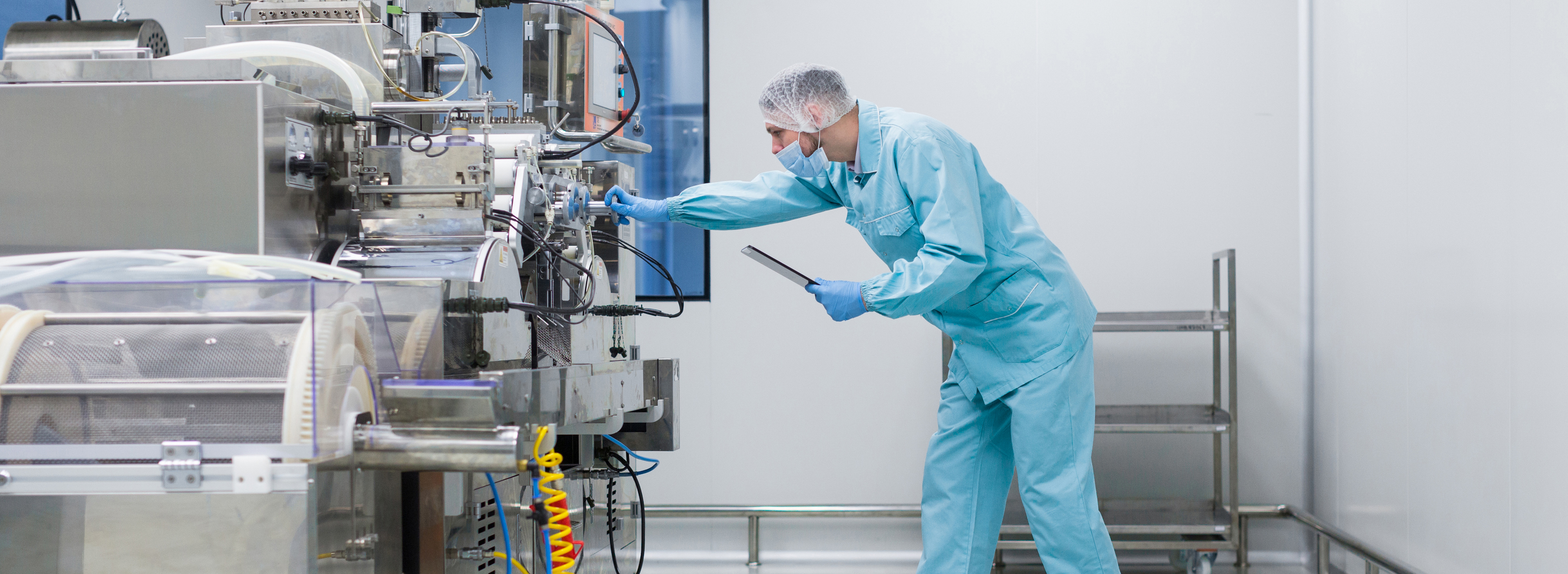 Widescreen picture, scientist configures control panel - stock photo