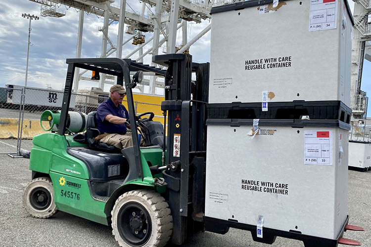 forklift moving fragile boxes