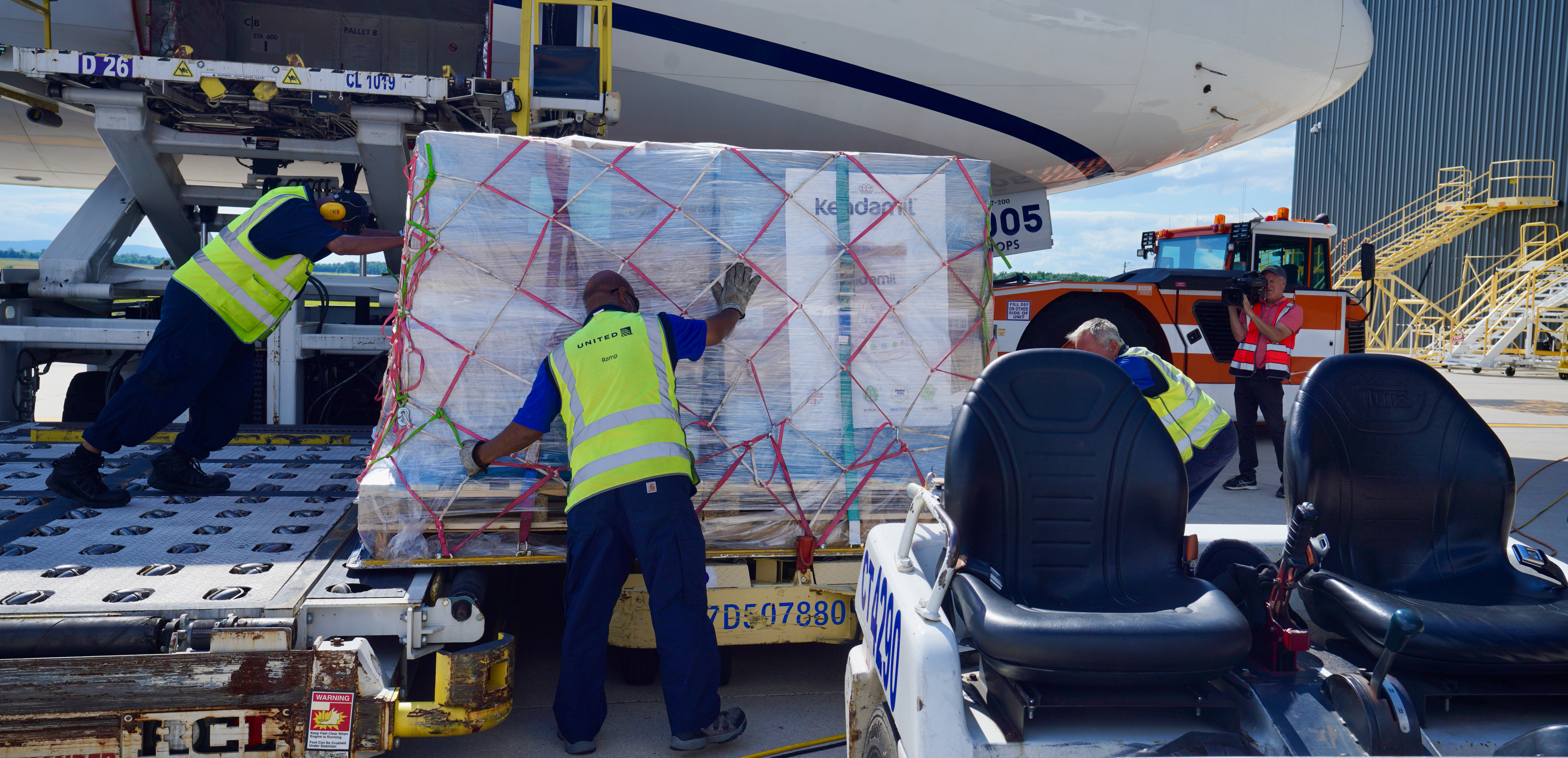SNS Supplies being off loaded from a supply plane
