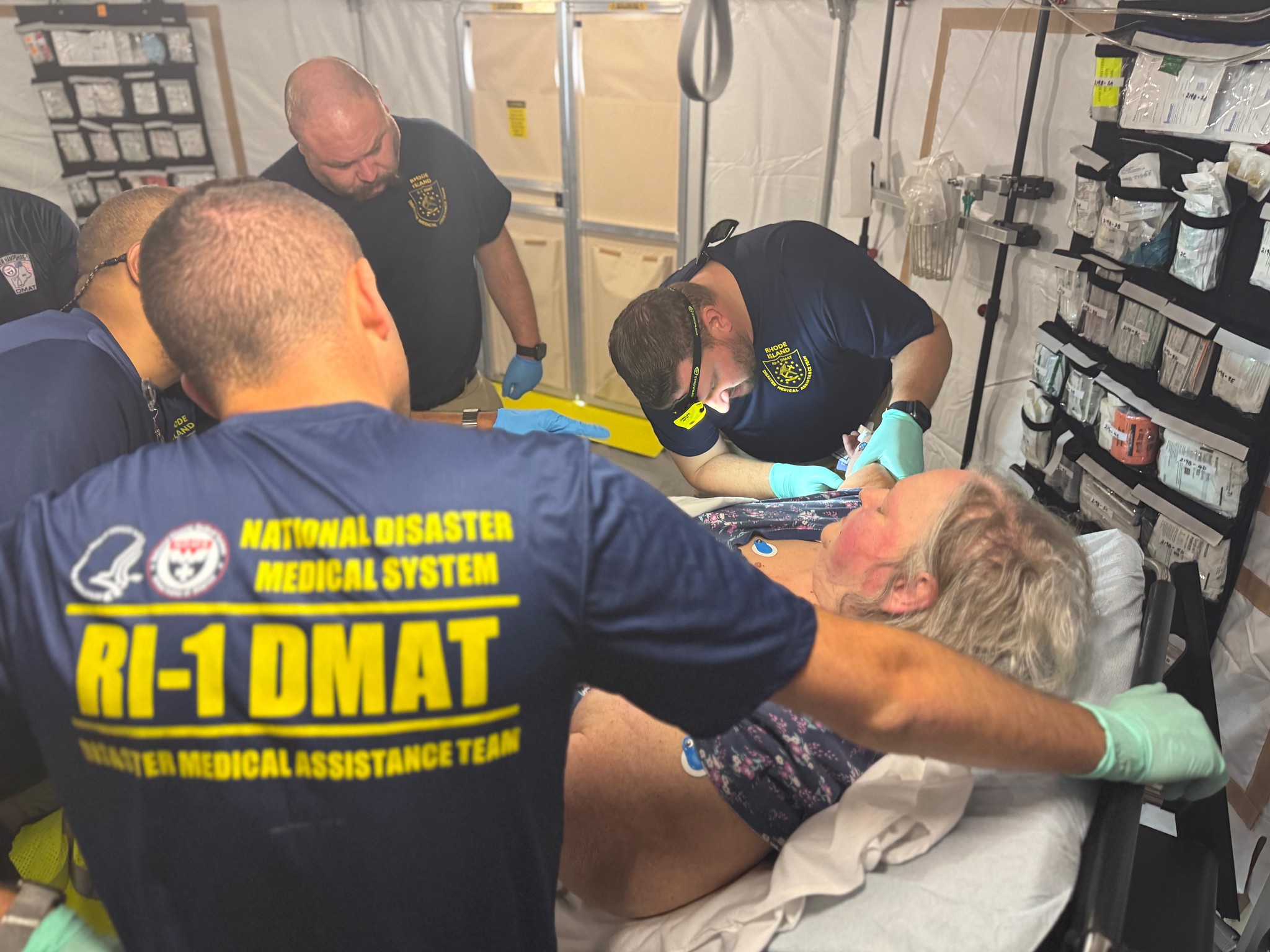 Responders from the National Disaster Medical System treating patients